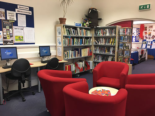 Alston Local Links interior showing seating area, computers and library